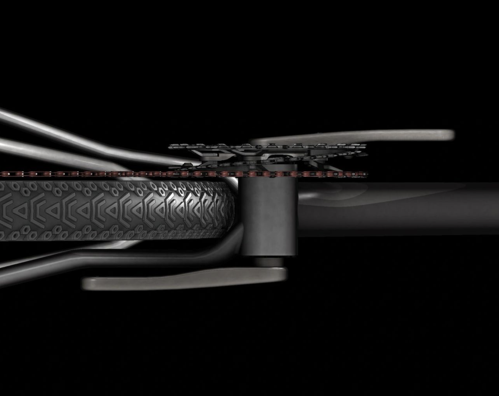 Triple front chainring underside on black background