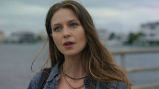 Melissa Benoist wears a jean jacket while talking to her character's ex by the water in The Waterfront.