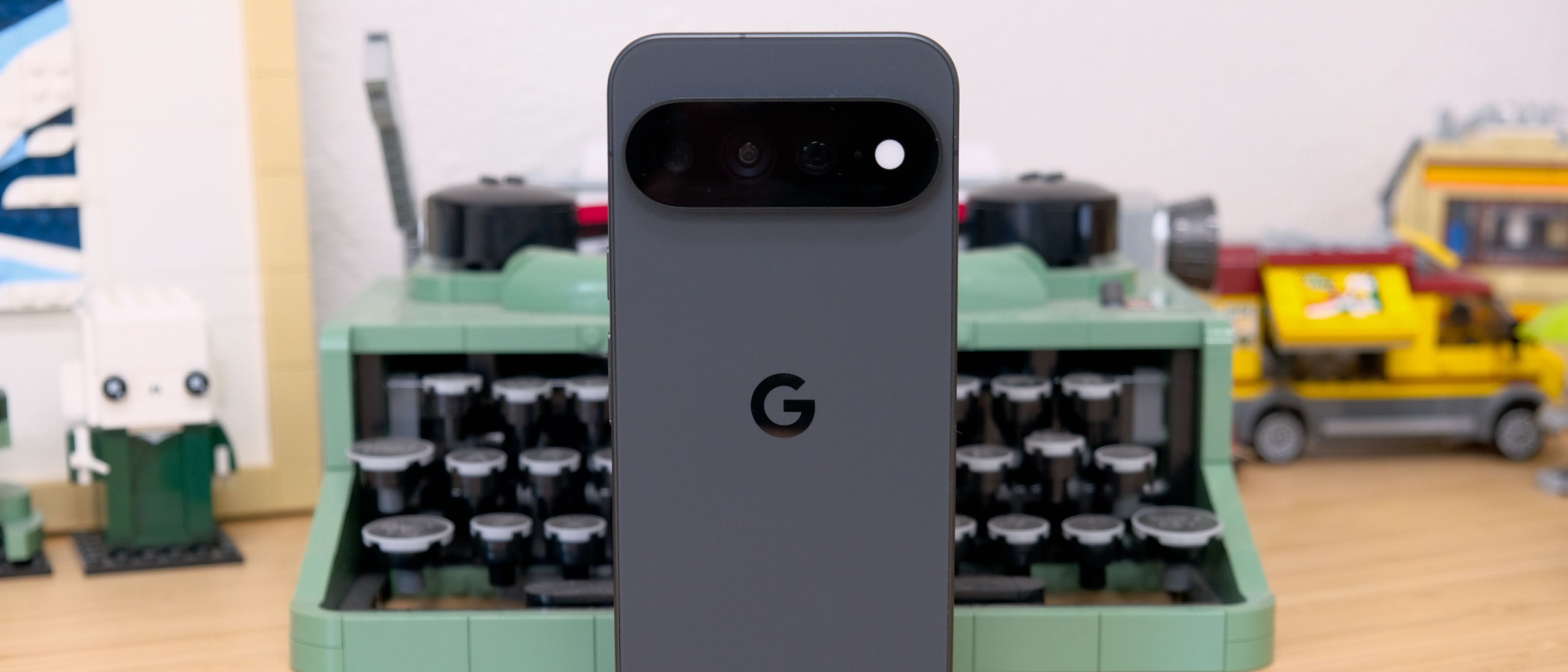 The Google Pixel 11 Pro XL resting on a wooden table