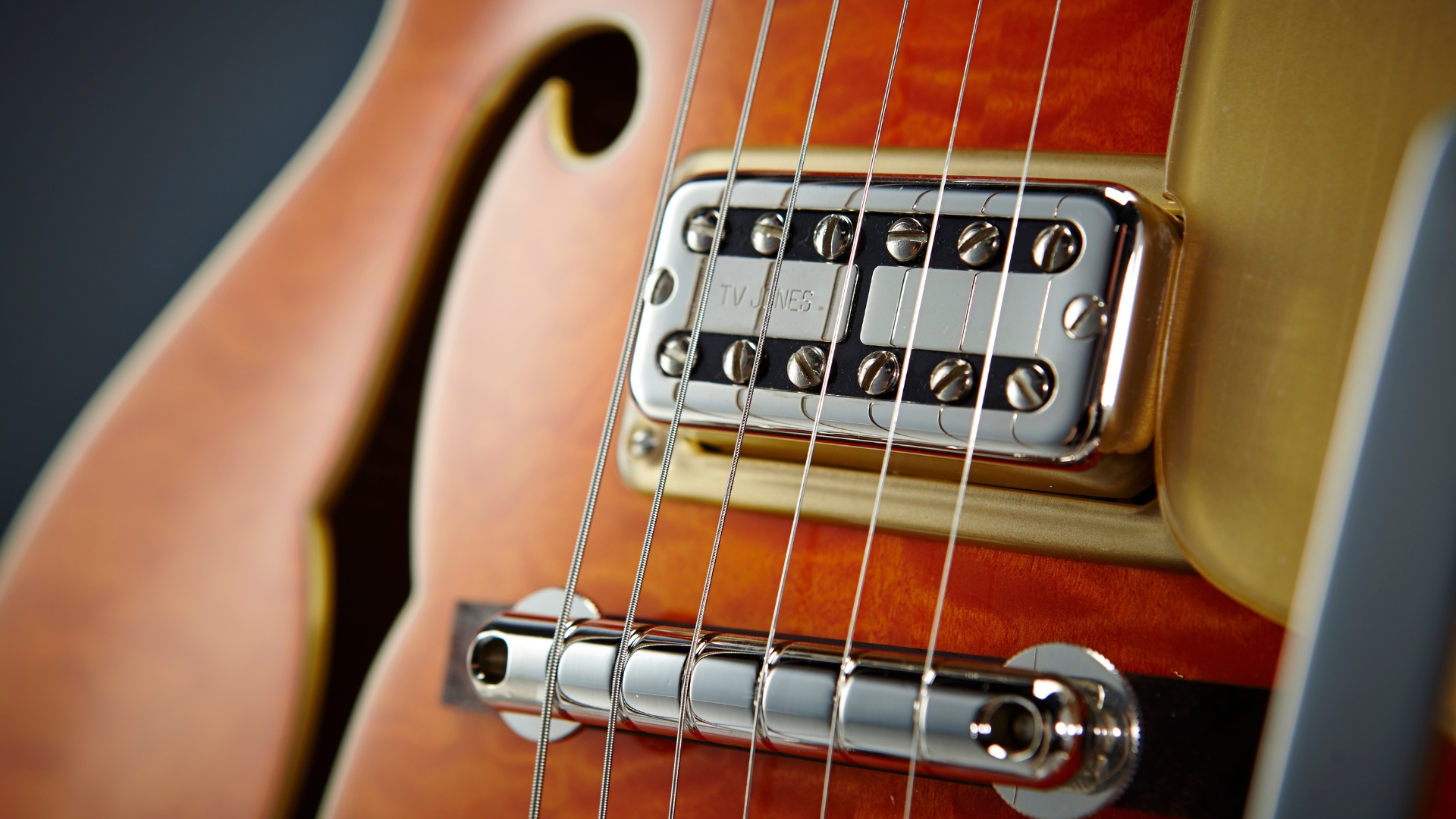 Close up of electric guitar strings on a Gretsch guitar
