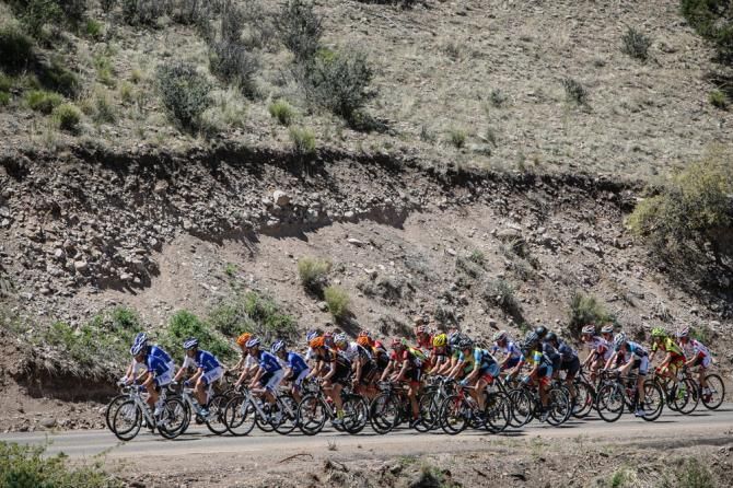 The men&rsquo;s field still together before the road gets steep