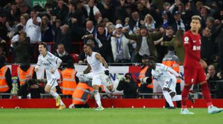 Leeds players celebrate after Crysencio Summerville's winning goal in the Premier League match between Liverpool and Leeds on 29 October, 2022 at Anfield, Liverpool, United Kingdom