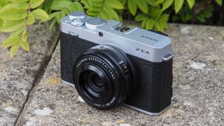 Fujifilm X-E4 on a stone surface