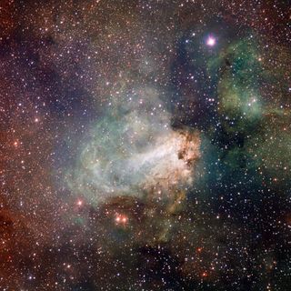 The first released VST image shows the spectacular star-forming region Messier 17, also known as the Omega Nebula or the Swan Nebula, as it has never been seen before. This vast region of gas, dust and hot young stars lies in the heart of the Milky Way in