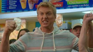 William Zabka in Netflix's Cobra Kai pumping his fists