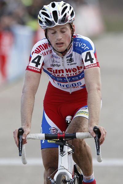 A rider looks exhausted at the finish.
