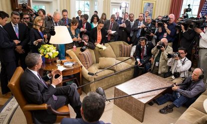 The media surrounds President Obama and King Abdullah of Jordan during a bilateral meeting on April 26.
