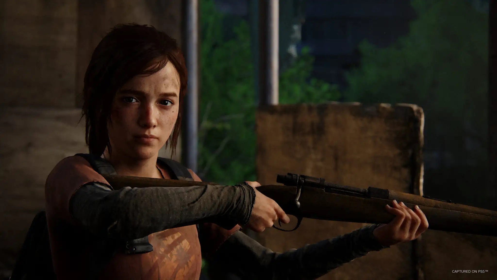 The Last of Us Part 1 Ellie holds a rifle