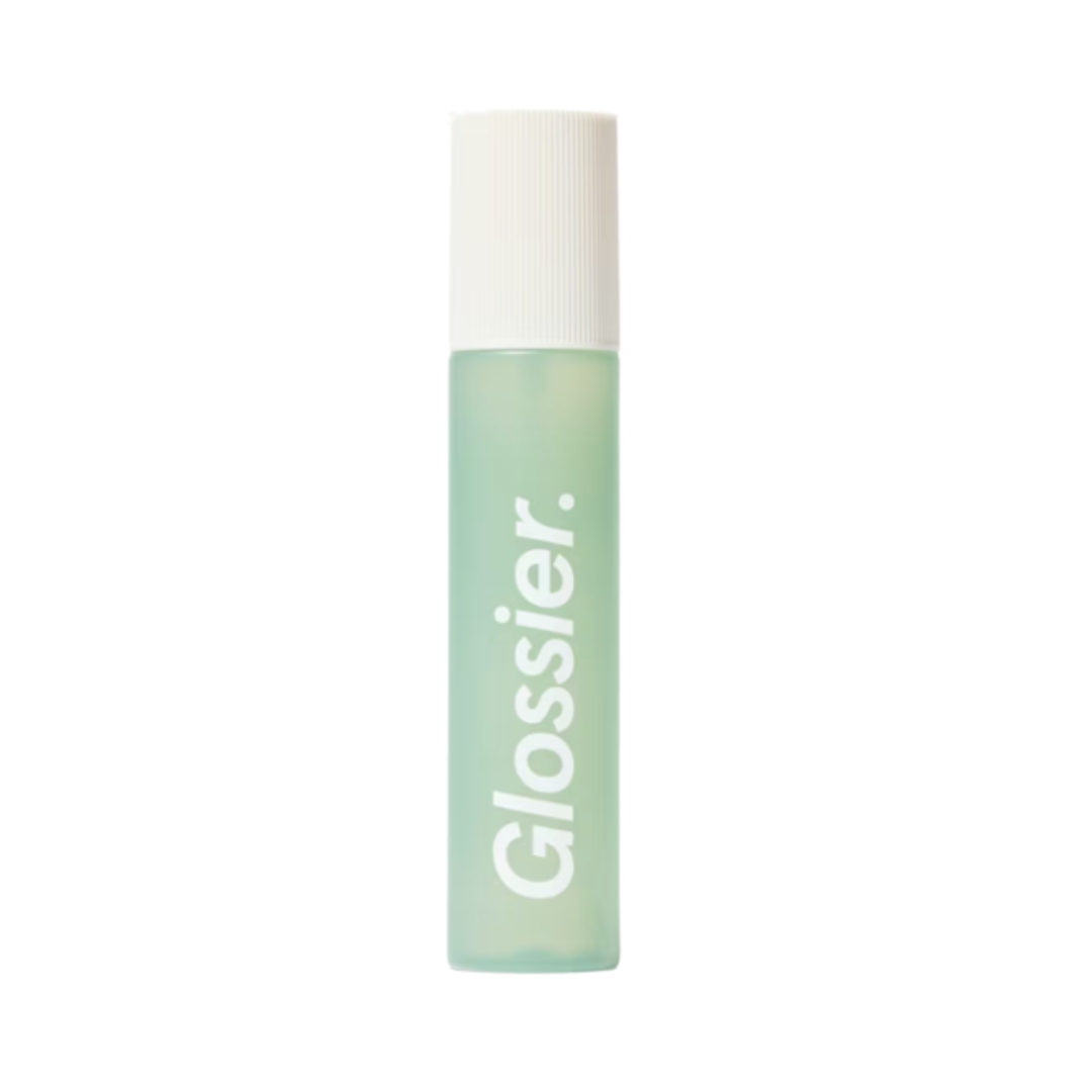 A product shot of the Glossier Sandstone body mist, on a white background