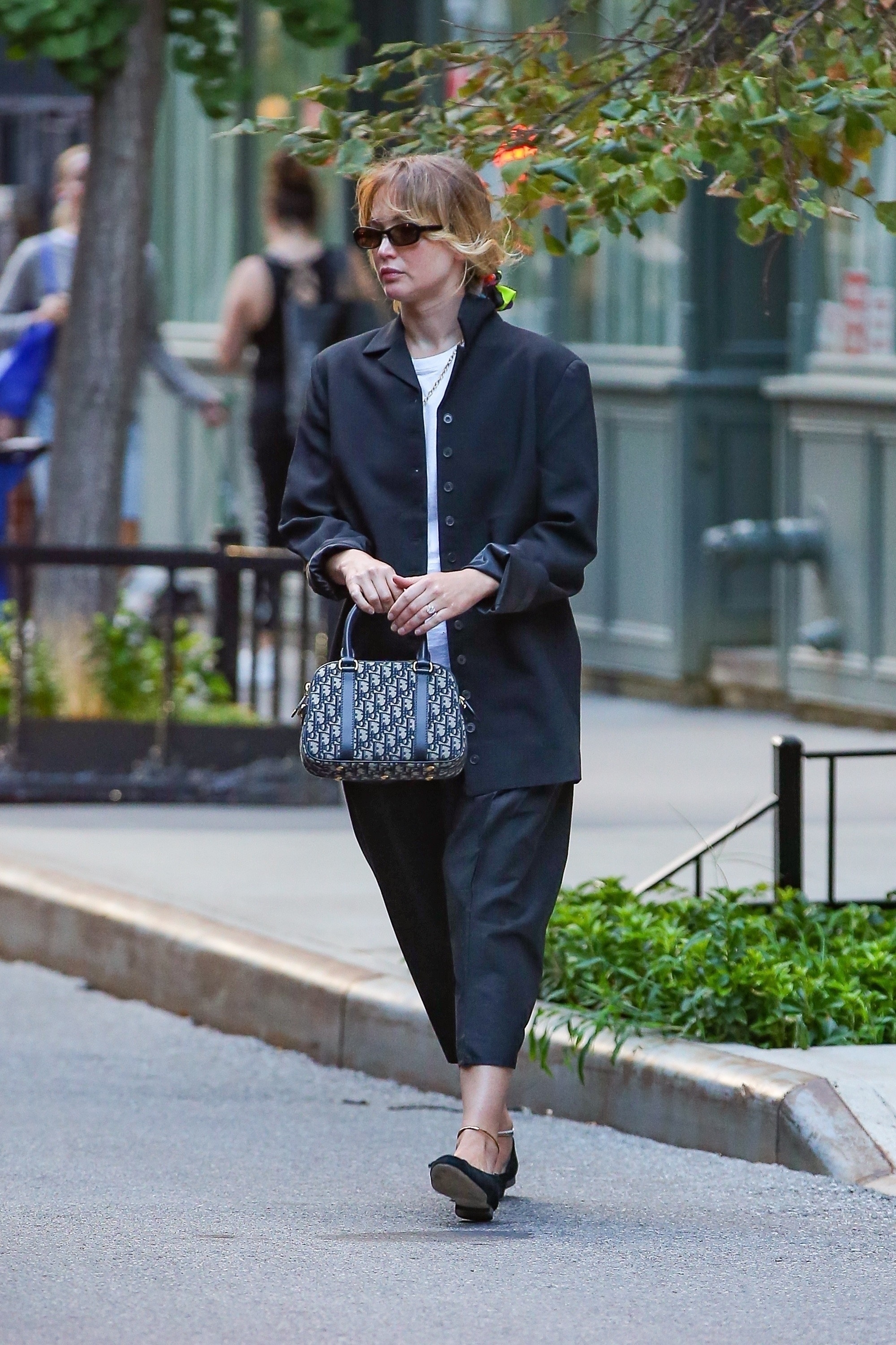 Jennifer Lawrence with a dior bowling bag