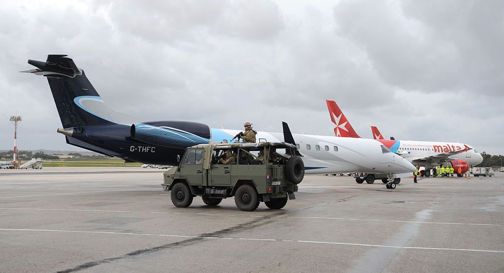 The military guards the runway at Malta airport