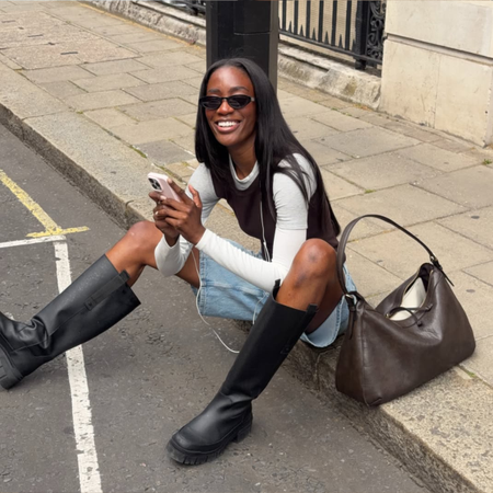 @_livmadeline wears summer outfit with boots