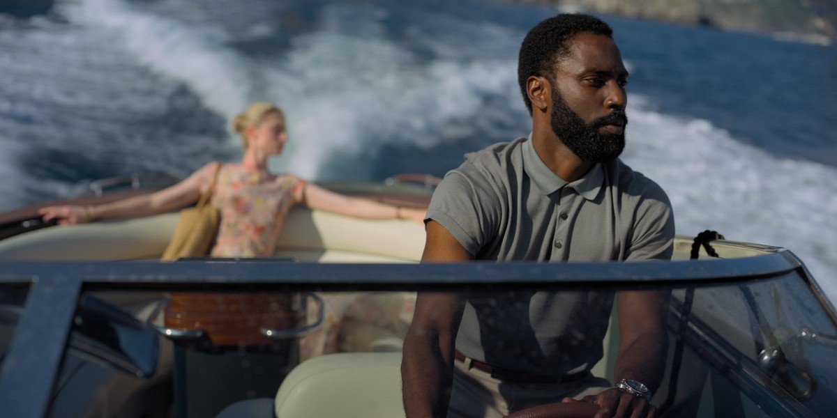 John David Washington and Elizabeth Debicki as Tenet (2020)