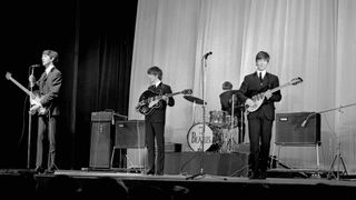 The Beatles performing in Paris on January 11, 1964 – their iconic array of Vox amps can be seen in the background