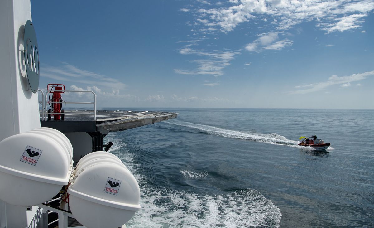 SpaceX support teams are deployed on fast boats from the SpaceX GO Navigator recovery ship ahead of the landing of the SpaceX Crew Dragon Endeavour spacecraft with NASA astronauts Robert Behnken and Douglas Hurley onboard, Sunday, Aug. 2, 2020 in the Gulf of Mexico off the cost of Pensacola, Florida.