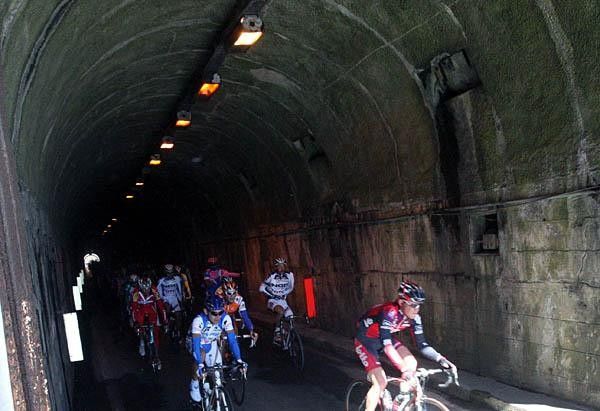 The peloton is across the top of the Passo del Turchino.