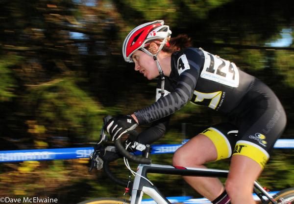 Marian Jamison (Ladies First Racing) rounding a pine tree