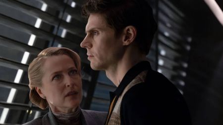 Gillian Anderson and Evan Peters as Elisabeth and Julian Dillinger in Tron: Ares