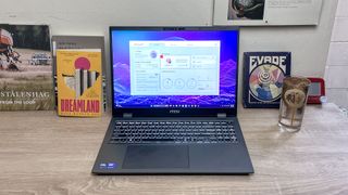 MSI Prestige 16 AI EVO (2025) review unit on desk