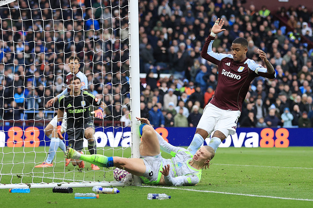 Erling Haaland was left in pain after sliding into the post against Aston Villa