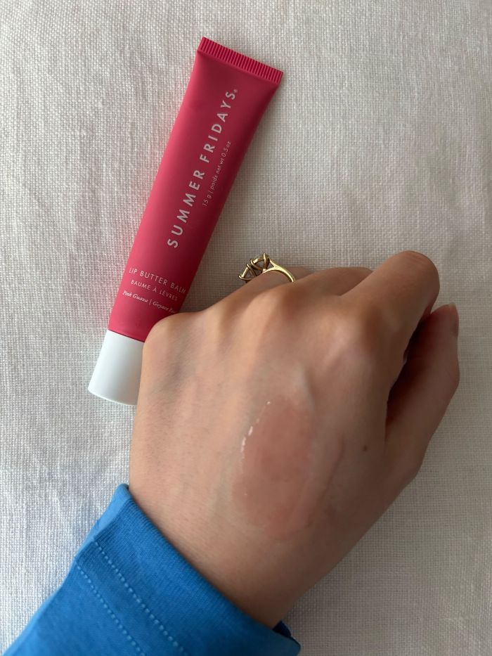 Deputy beauty editor Grace Lindsay swatching the Summer Fridays Lip Butter Balm