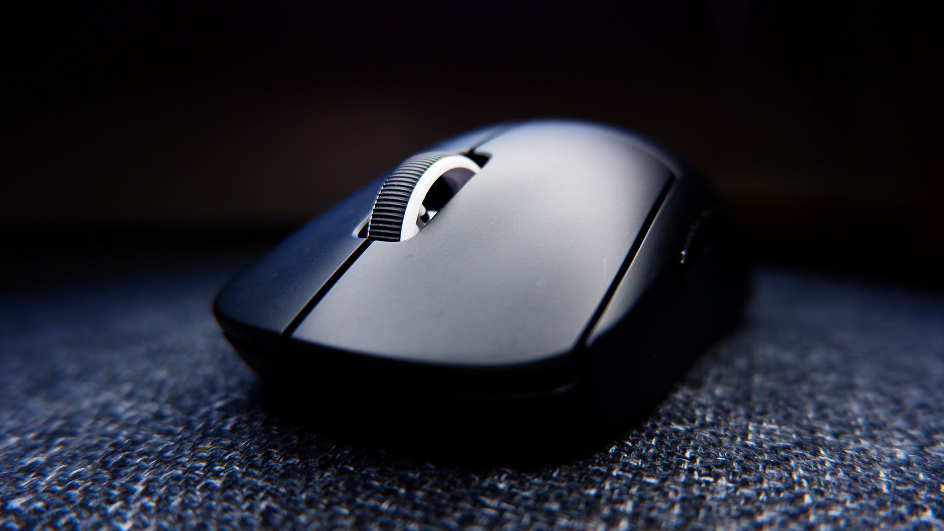 Logitech G Pro X Superlight gaming mouse pictured with dark background