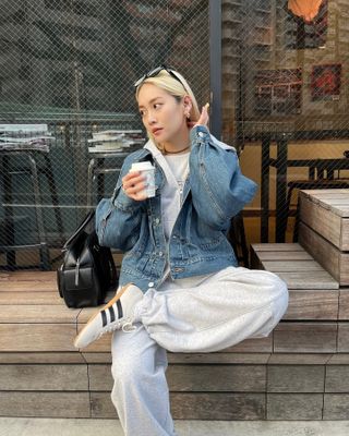 Influencer wears Adidas Tokyo trainers.