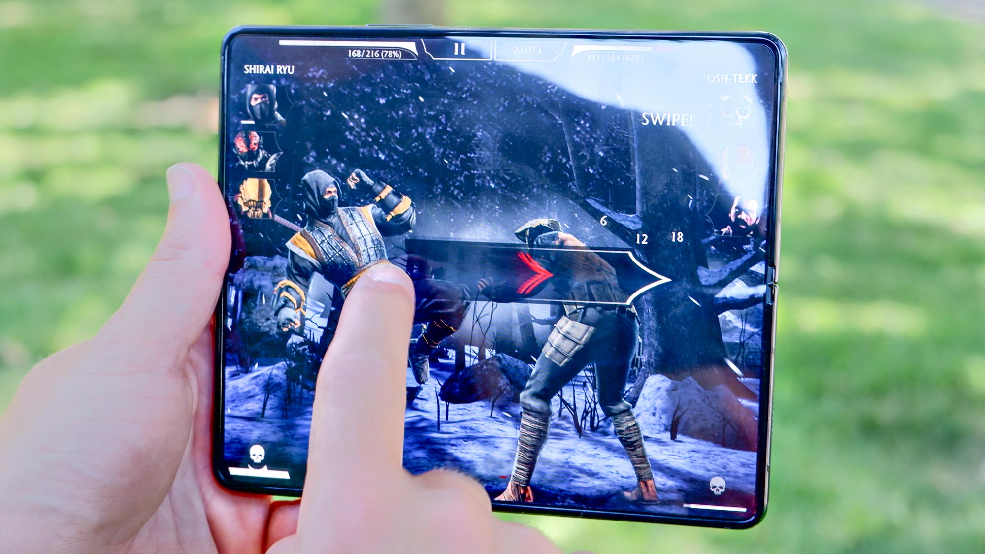 Samsung Galaxy Z Fold 5 playing Mortal Kombat game