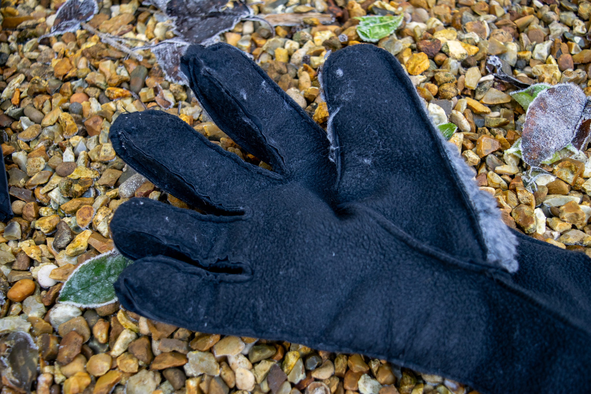 An inside out Q36.5 Termico glove on some gravel  