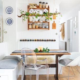 White kitchen with banquette corner seating