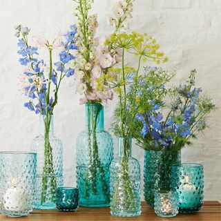 candle holders and hobnail bottles by west elm