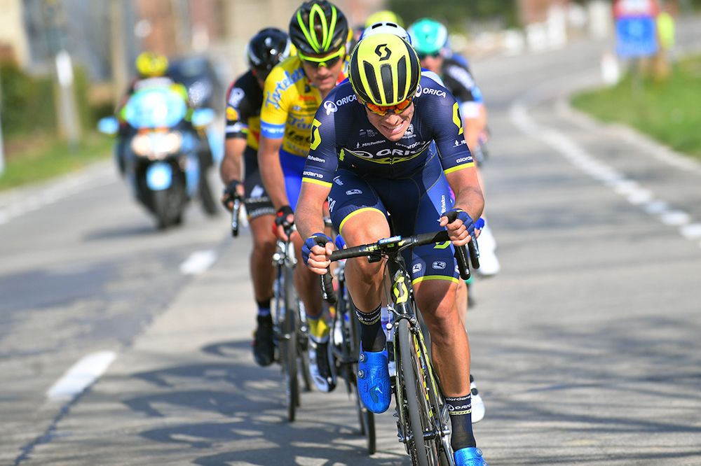 Alexander Edmondson powers the group during stage 1 at Three Days of De Panne