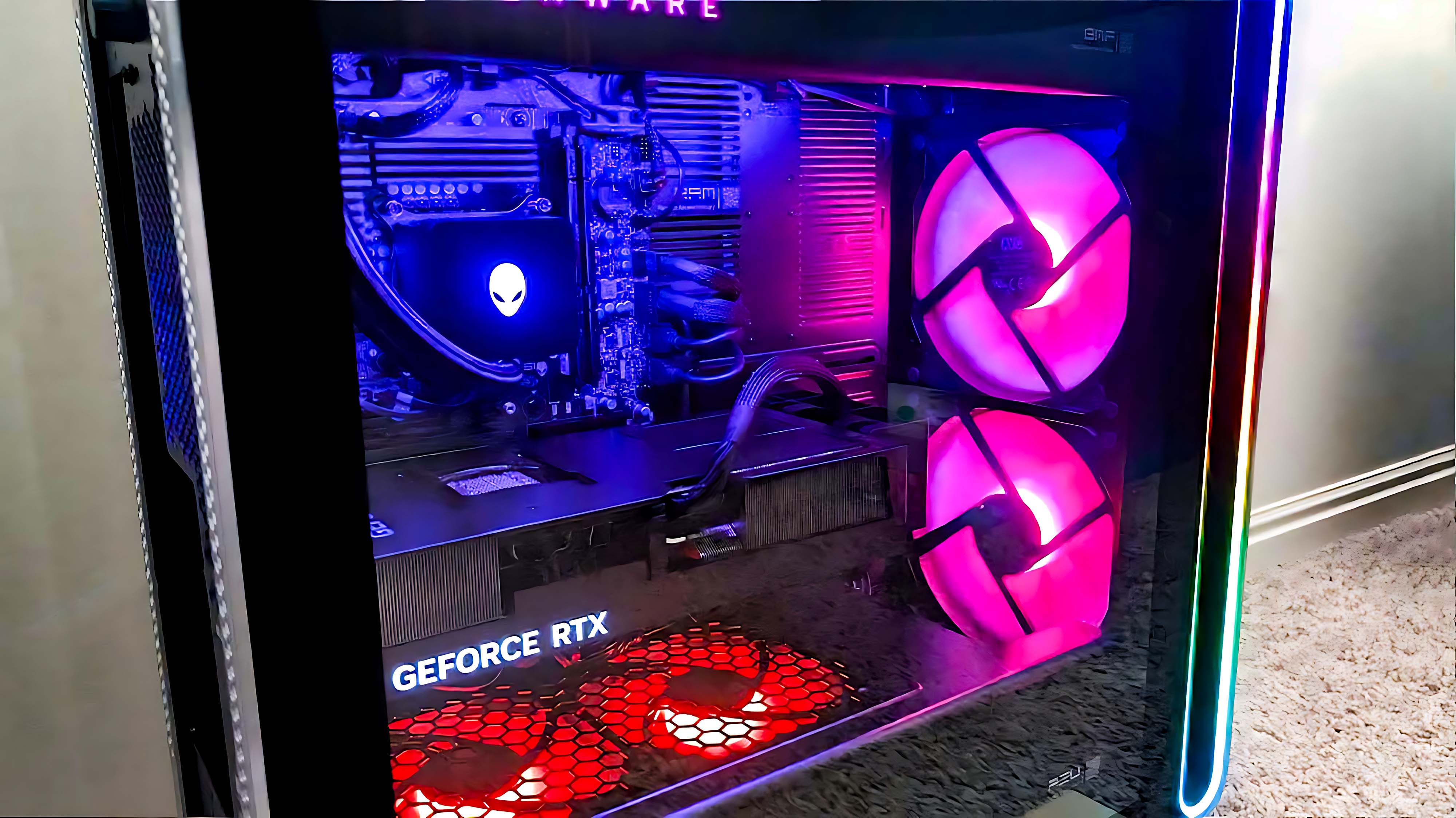 Colorful RGB lighting up the inside of the Alienware Area-51 Gaming Desktop (2025).