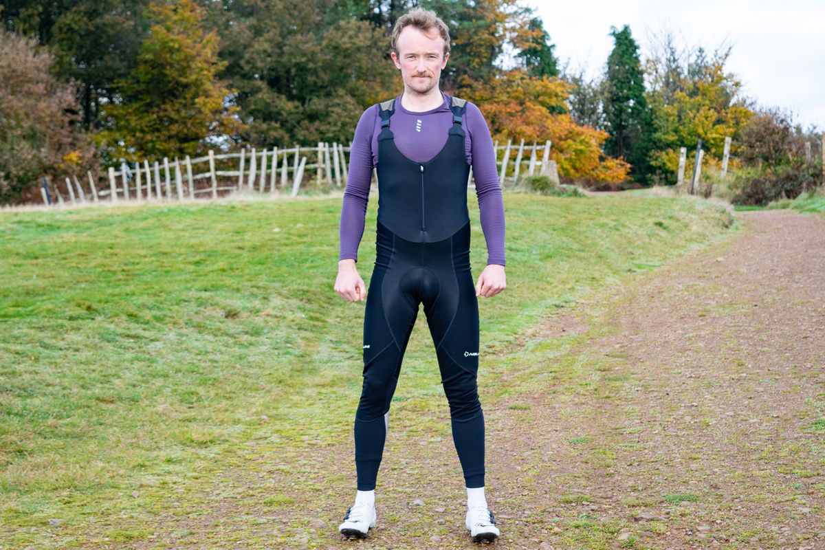 A man wearing a pair of Nalini Ergo X Warm winter bibtights