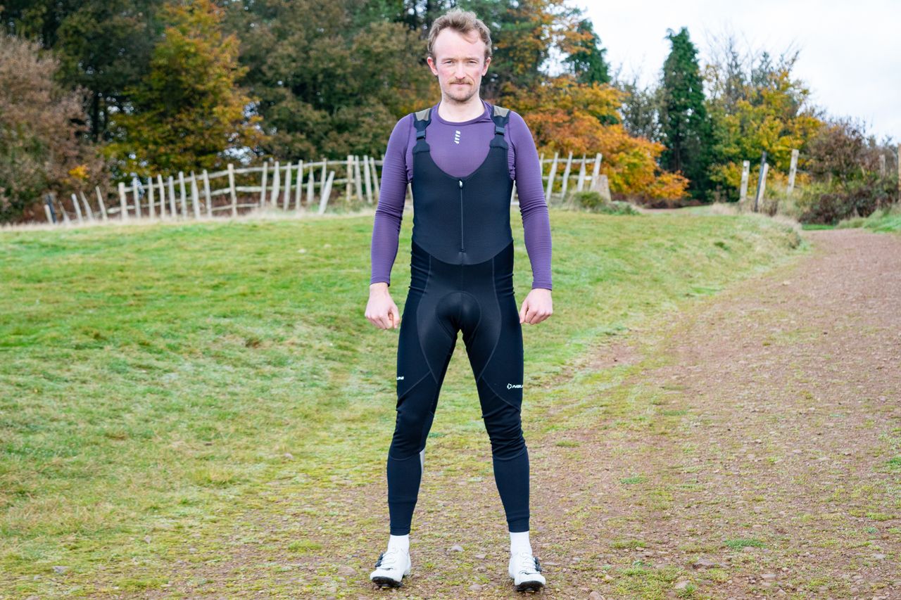 A man wearing a pair of Nalini Ergo X Warm winter bibtights