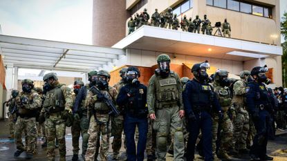 Federal agents amass outside ICE facility in Portland, Oregon