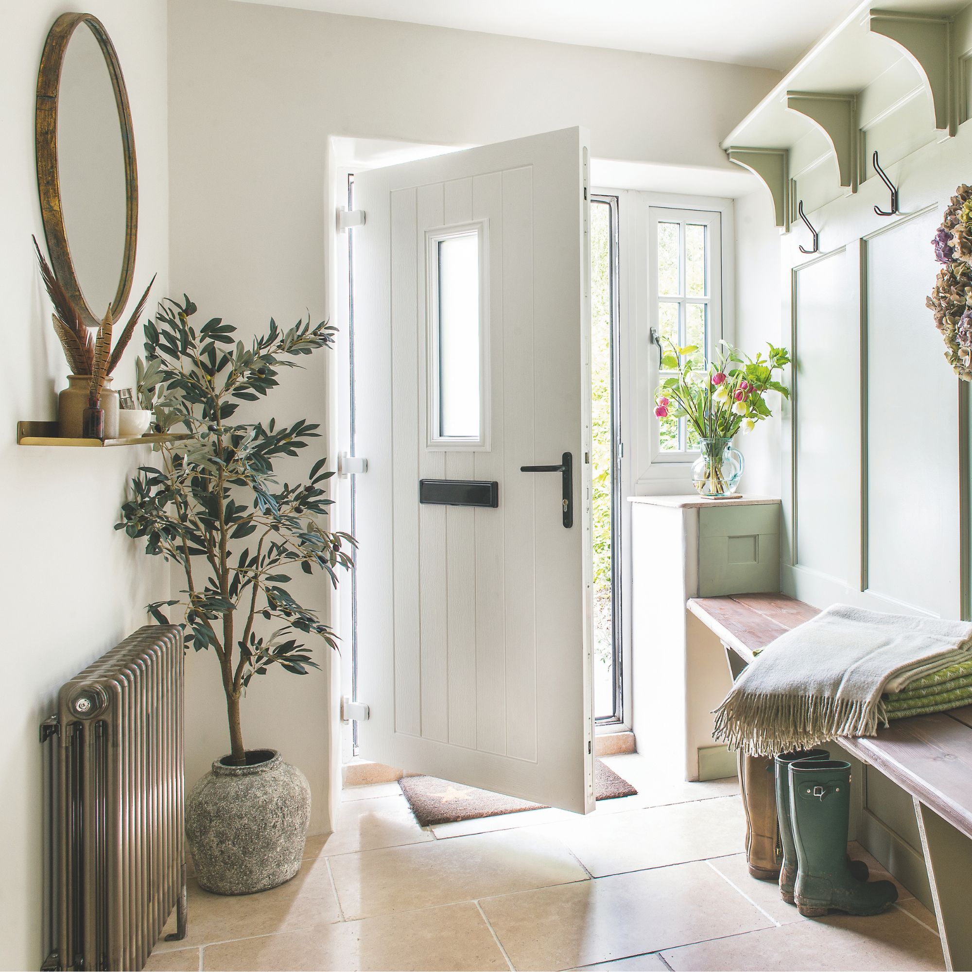 Cottage hallway with autumnal decor throughout