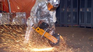 Man working with angle grinder