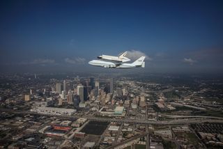Endeavour over Houston Skyline
