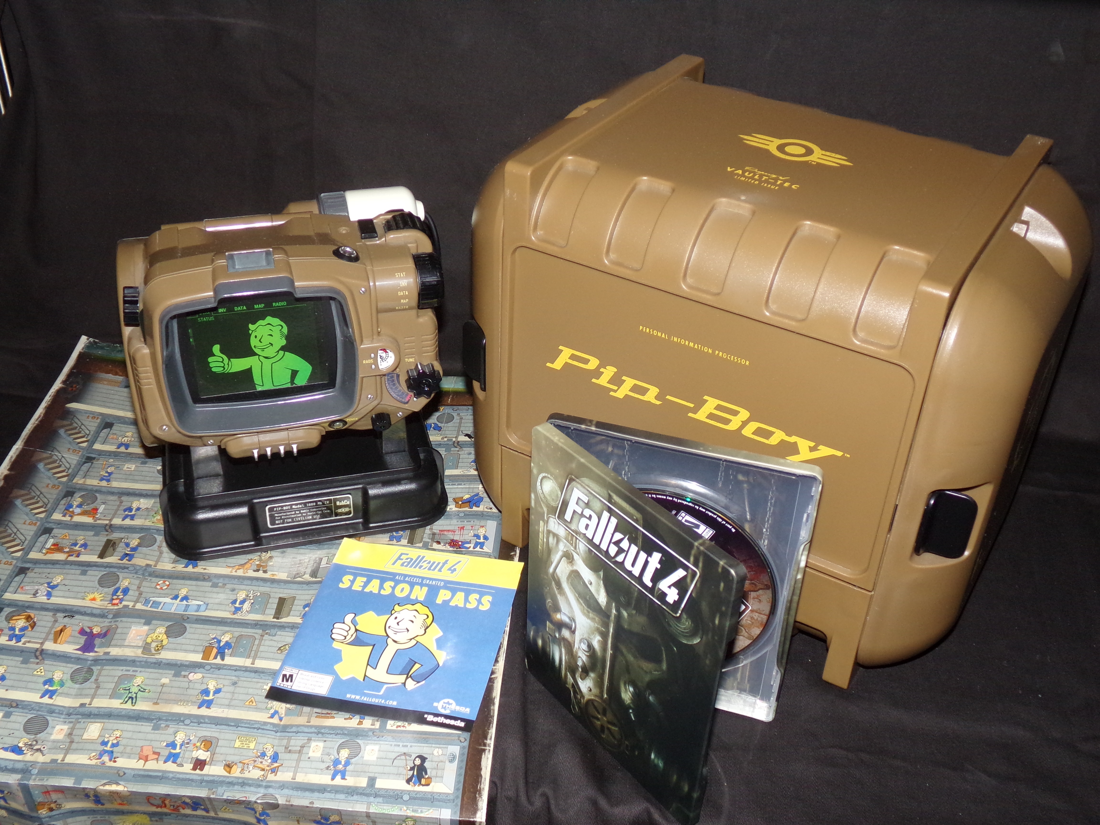 Fallout 4's collector's edition spread complete with bomb proof case and pipboy