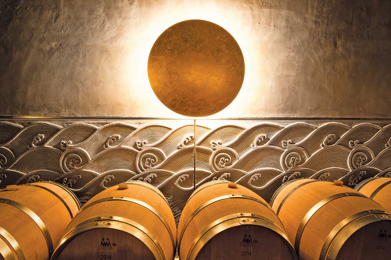 DES287.cellars_to_visit.chateau_marquis_dalesme_barrels_in_lower_cellar_credit_eloise_vene.jpg