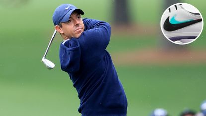 Rory McIlroy hits a wedge shot 