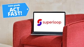 Laptop on red couch with Superloop logo on screen and tom's guide blue deal badge on top corner