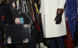 Briefcase and black gloves