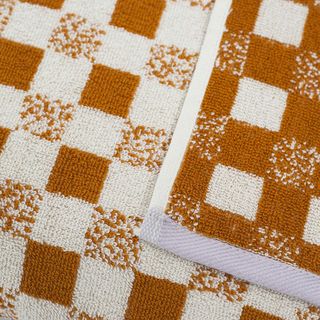 White and orange checkered towel