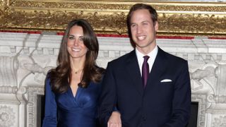 Prince William and Kate Middleton pose for photographs in the State Apartments of St James Palace on November 16, 2010 after announcing their engagement