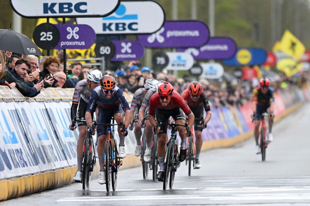 OUDENAARDE BELGIUM MARCH 31 LR Michael Matthews of Australia and Team Jayco AlUla and Luca Mozzato of Italy and Team Arkea BB Hotels sprint at finish line during the 108th Ronde van Vlaanderen Tour des Flandres 2024 Mens Elite a 2708km one day race from Antwerpen to Oudenaarde UCIWT on March 31 2024 in Oudenaarde Belgium Photo by Dario BelingheriGetty Images