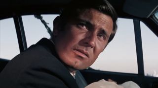 George Lazenby sits saddened in his car in On Her Majesty's Secret Service.