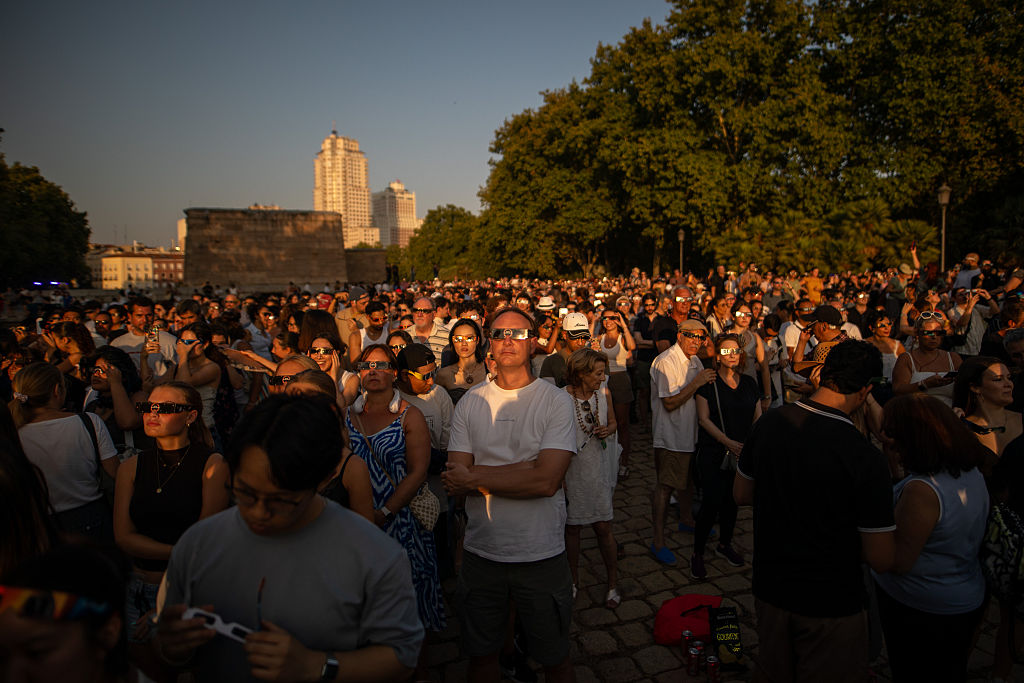 Hundreds of people gather to view the solar eclipse at the Debod Temple in Madrid, Spain, on August 12, 2026.
