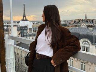 Fashion influencer @livvperez wearing an on-trend winter outfit in Paris.